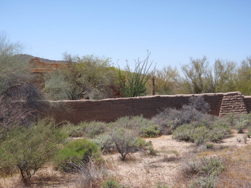 Adobe fence and southwest homes.